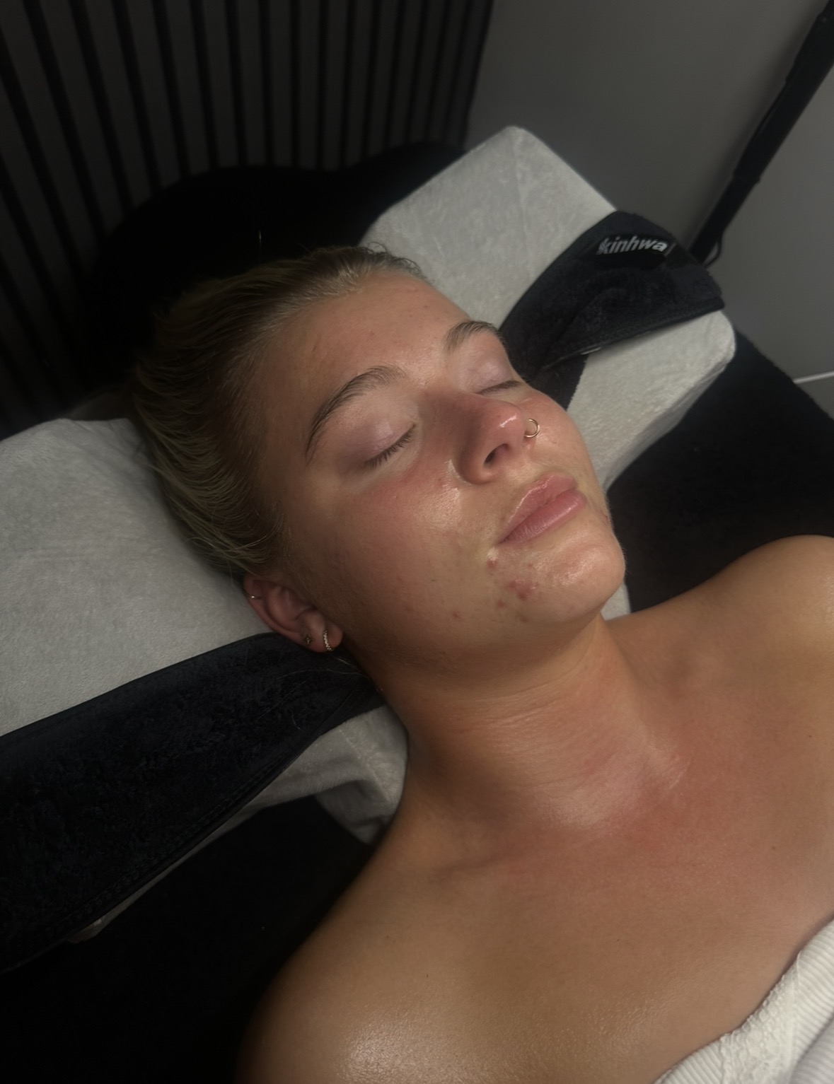Client after a glowing facial treatment